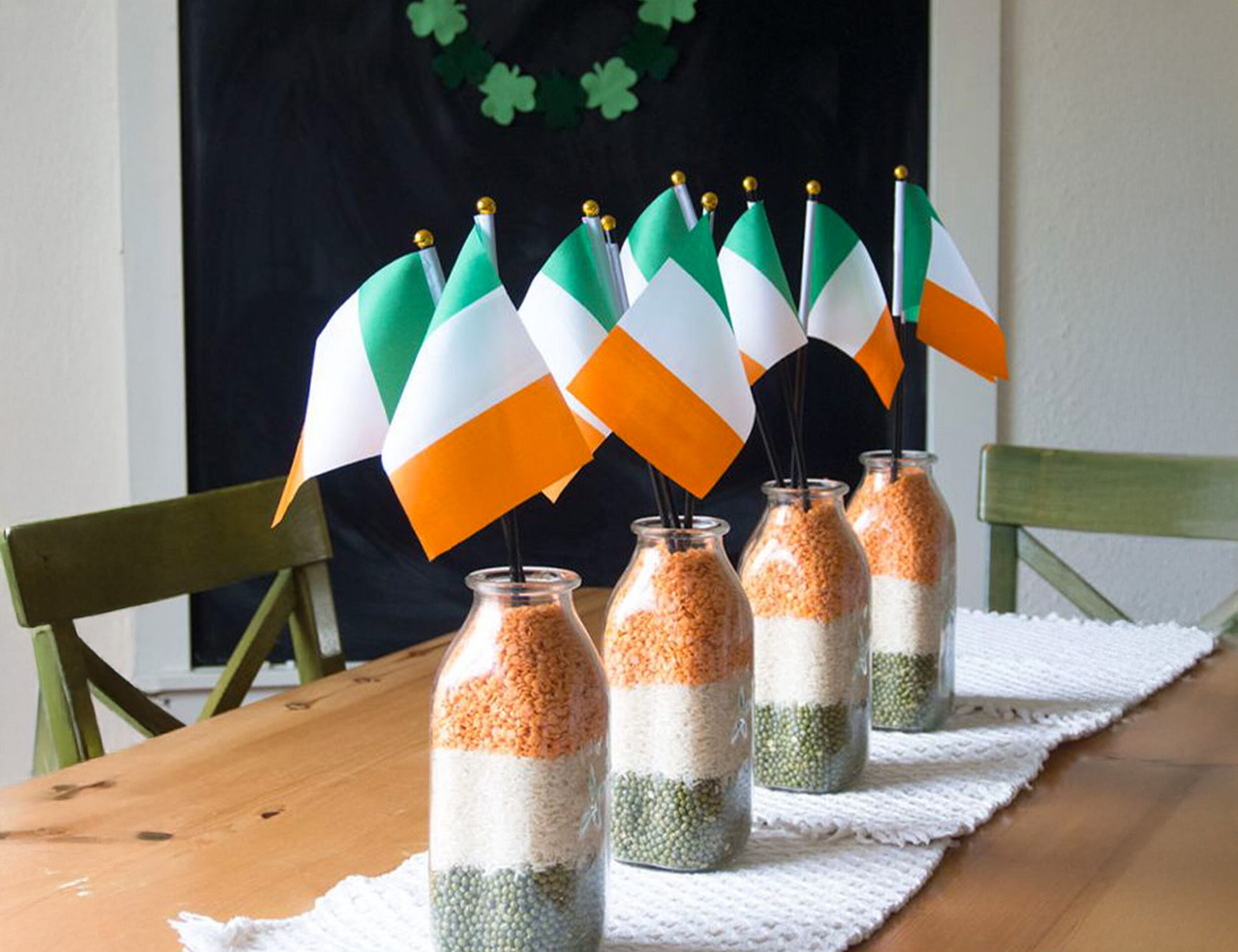 A beautifull botteles filled with indian flag colour groats with indian flag in it